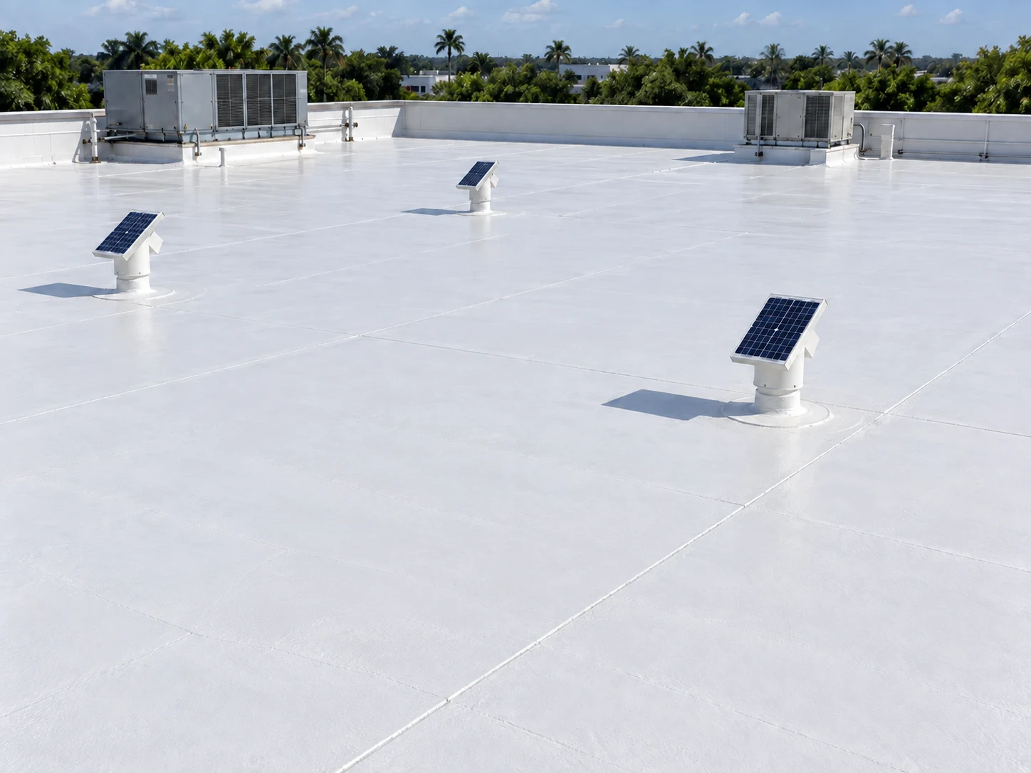 AI-generated elevated view of a white-coated commercial roof with three widely spaced solar-activated two-way vents