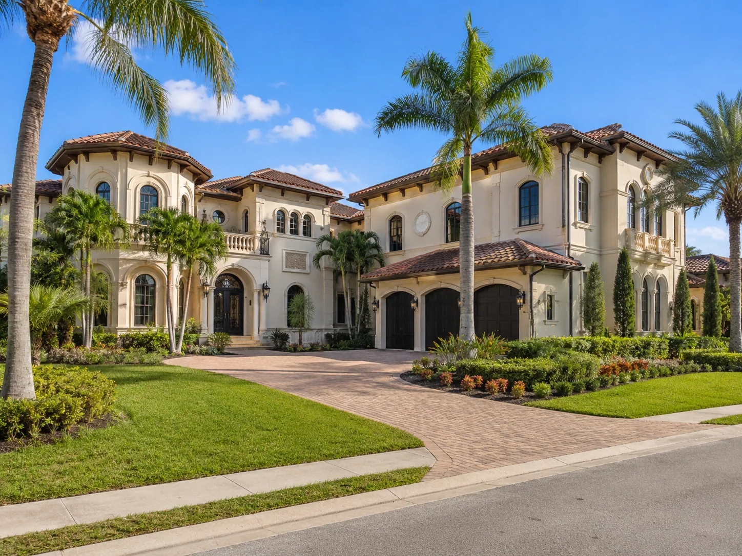 Luxury Central Florida home with barrel tile roof and tropical landscaping